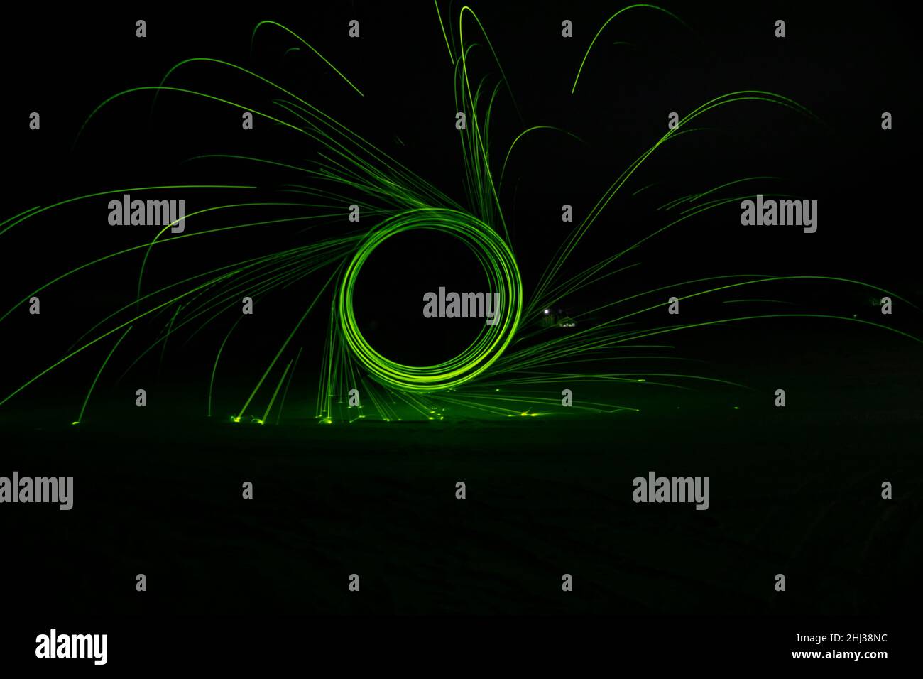 Circles with sparks on a black background Stock Photo