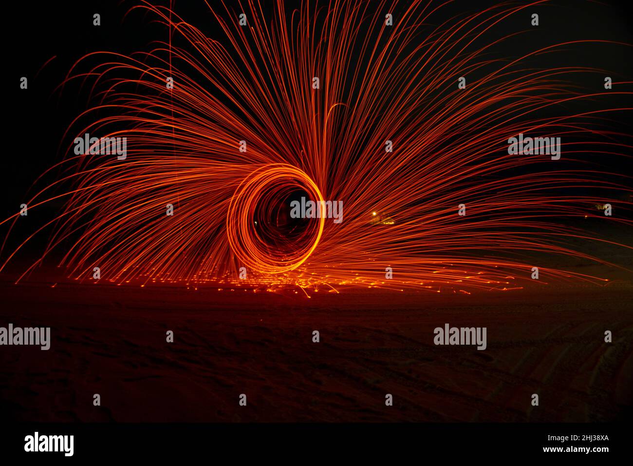 Circles with sparks on a black background Stock Photo