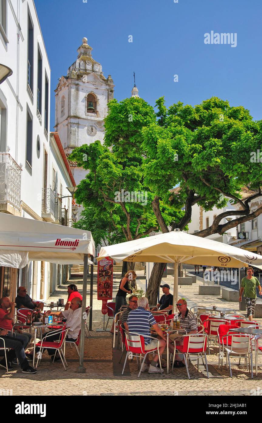 Street cafe showing Igreja de Santo Antonio Church, Lagos, Algarve Region, Portugal Stock Photo