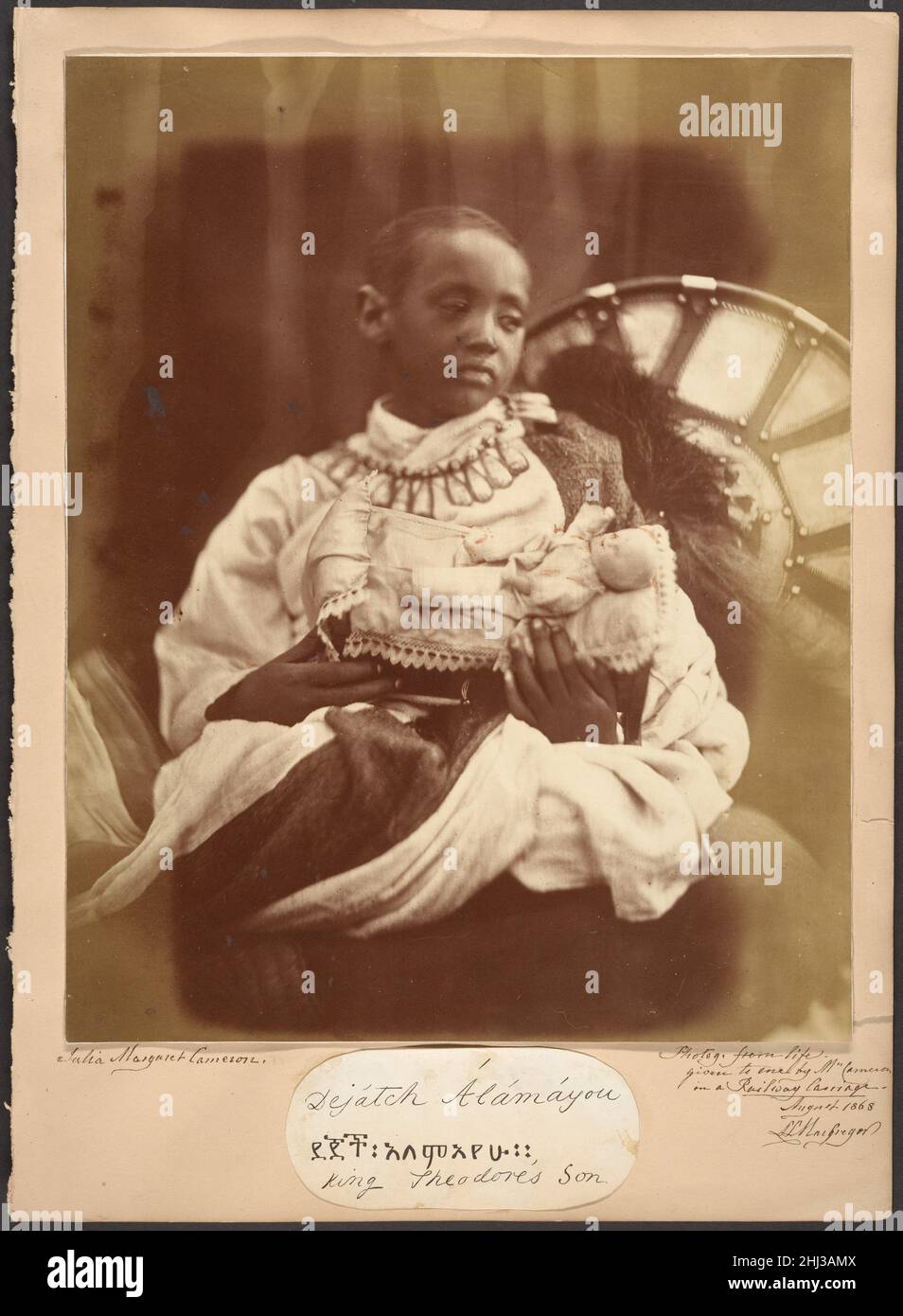 Déjatch Alámayou, King Theodore's Son July 1868 Julia Margaret Cameron British, born India Déjatch Alámayou was taken to England after the British defeat of the Ethiopians at the battle of Magdala and the suicide of his father, Tewodros (Theodore) II, emperor of Ethiopia, in April 1868. Queen Victoria took an interest in Alámayou and saw to his education and protection, placing him in the care of Captain Tristram Speedy, who, like Cameron, had a home on the Isle of Wight. Speedy brought the child to Cameron’s house shortly after his arrival in England, and Cameron made ten photographs of the c Stock Photo