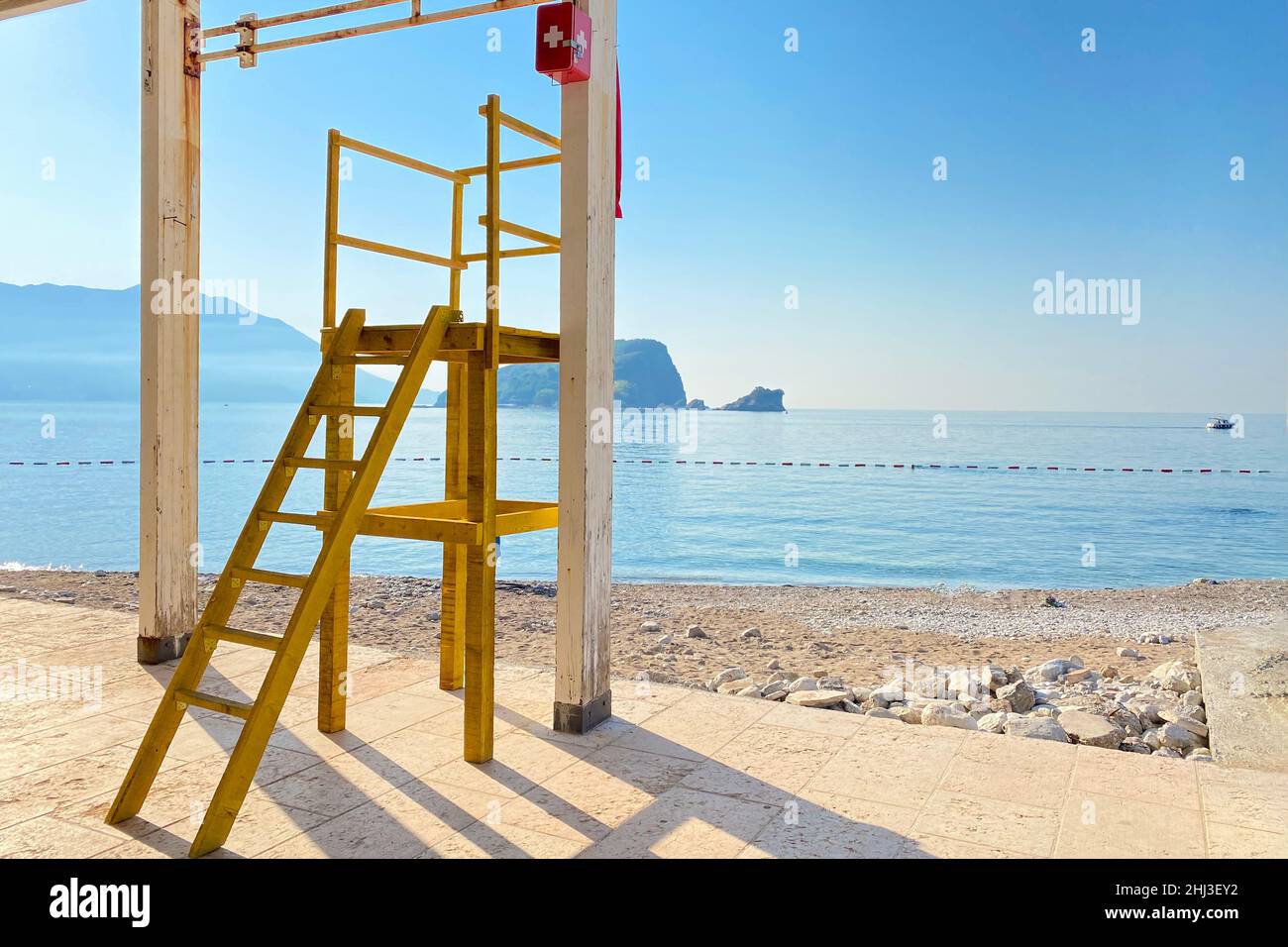 Rescue station on the sea beach. Rescue cabin on the coastline in sunny ...