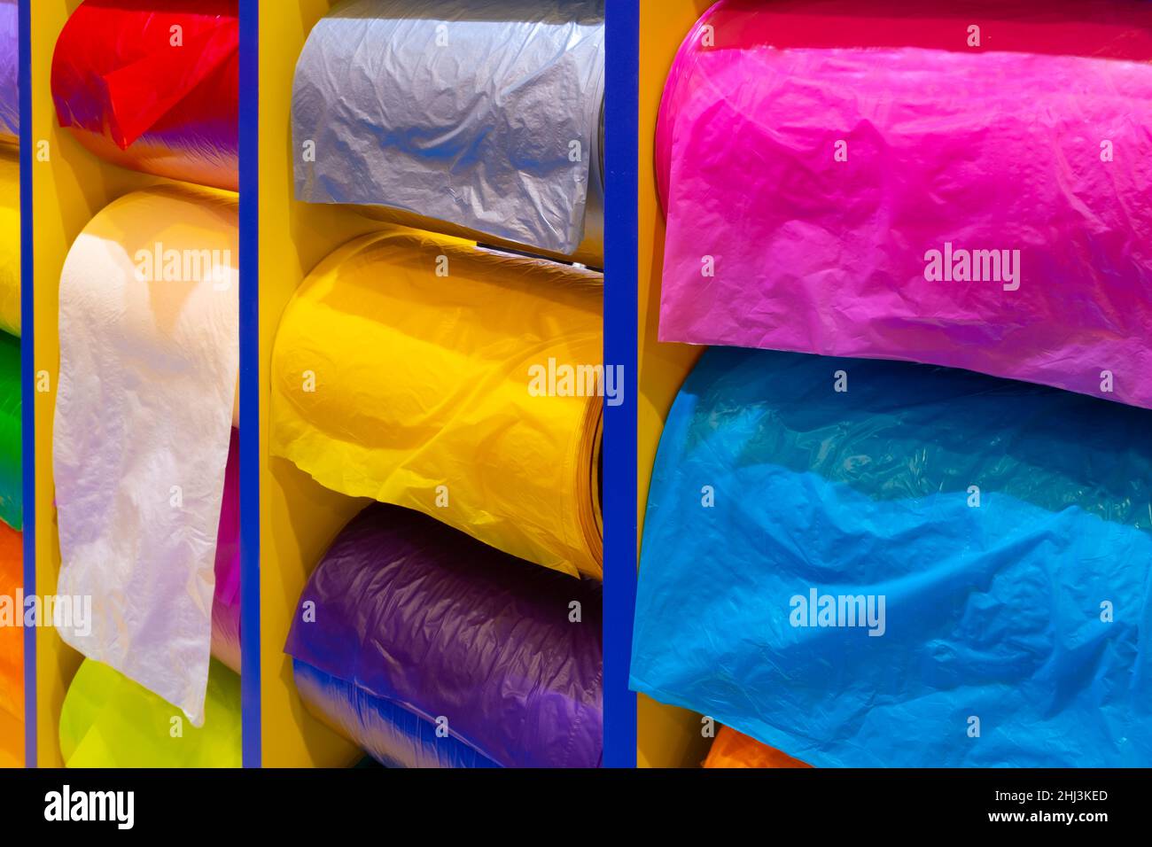 https://c8.alamy.com/comp/2HJ3KED/multicolor-rolls-of-polyethylene-film-in-stock-modern-warehouse-and-storage-systems-2HJ3KED.jpg