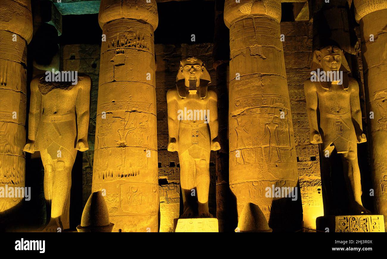 Statue of Ramses II lit up at Night, Temple of Luxor, Luxor, Egypt ...