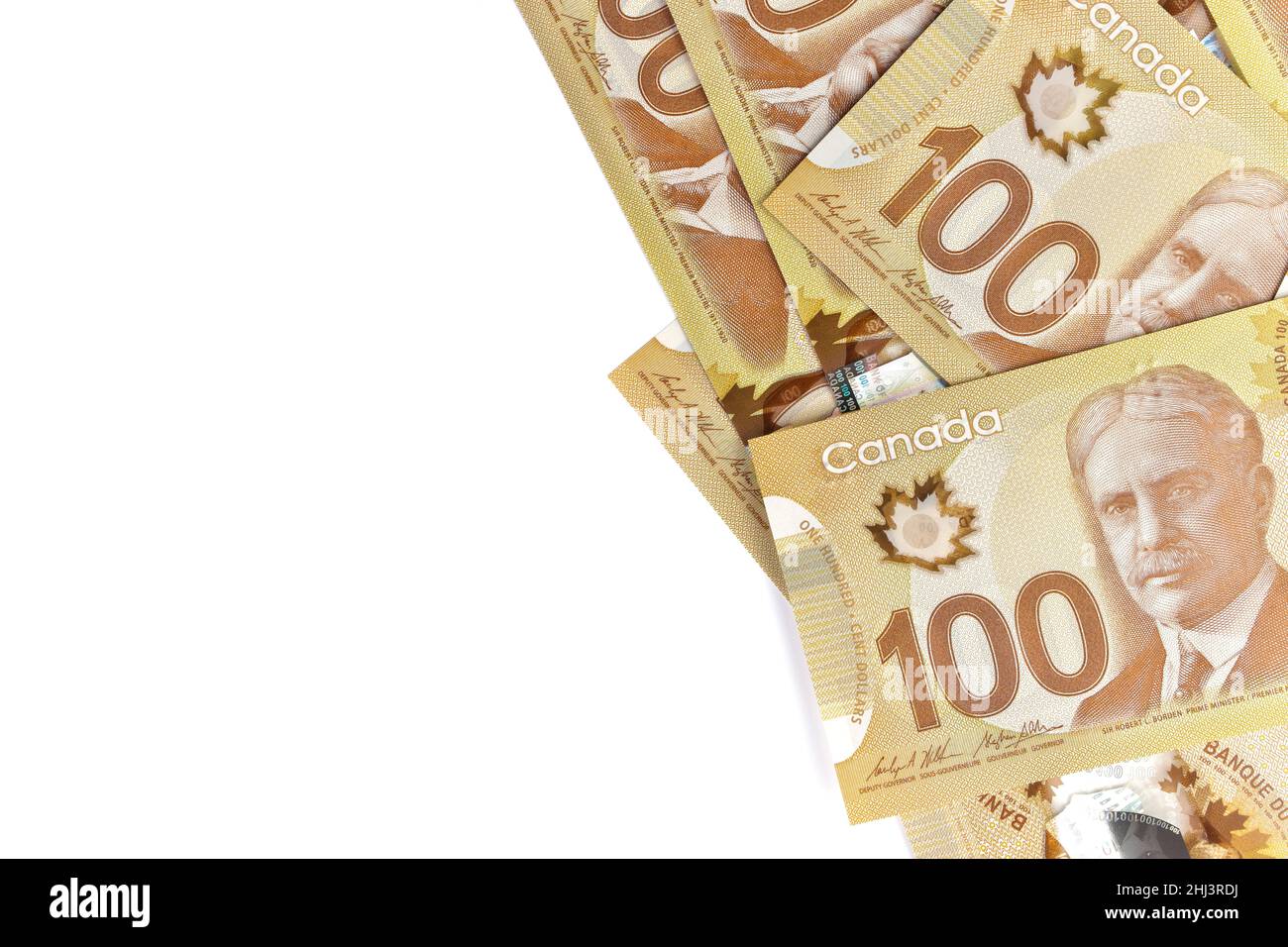 Directly Above Image of Crisp Canadian 100 One Hundred Dollar Bills on a White Background Stock Photo