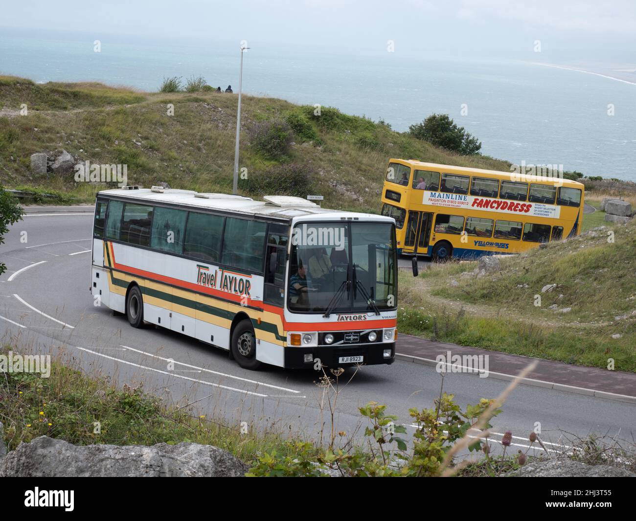 Coach climbing the hill at Portland Heights on a rally to Portland Bill Stock Photo