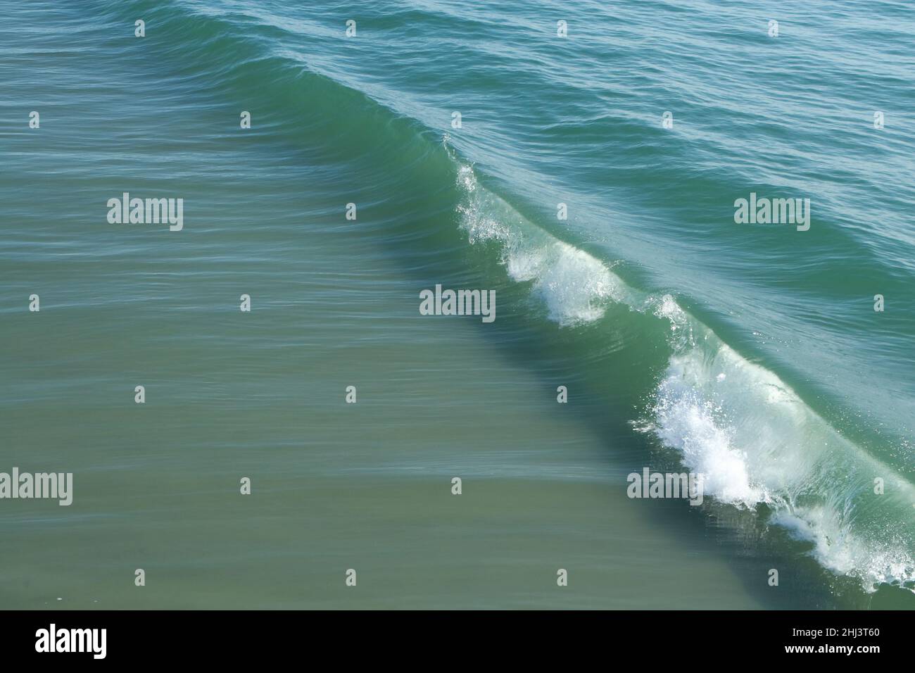 Ocean and tide moving on the sea floor.  Clear water, flowing movement of the ocean Stock Photo