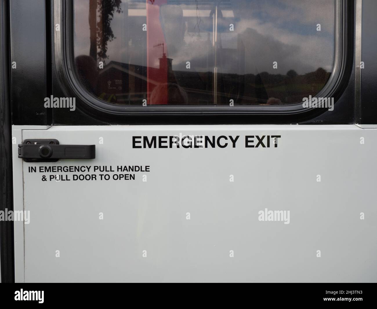 Bus emergency exit handle Stock Photo