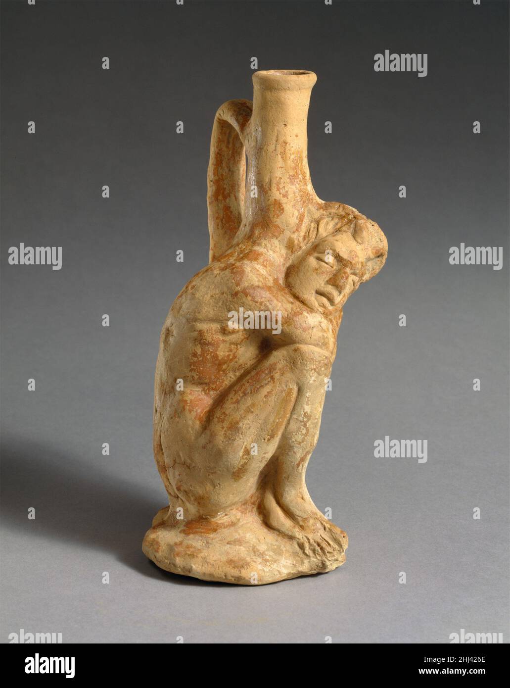 Terracotta vase in the form of a sleeping Black African youth ca. 3rd2nd century B.C. Cypriot