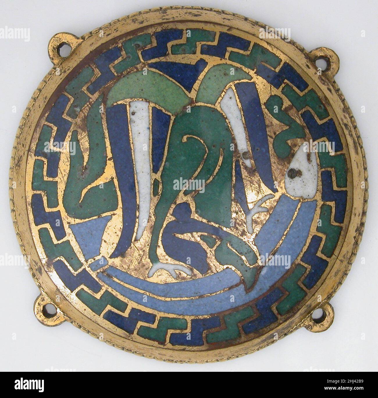 Eagle Attacking a Fish (one of five medallions from a coffret) ca. 1110–30 French The blue and green beasts, locked in battle and compressed into the circular medallion, are emblematic of goldsmith work created at Conques under the patronage of Abbot Boniface (r. 1107–after 1121). On a similar box still at Conques, an inscription proudly proclaims: “In all respects, the coffrets of Conques demonstrate brilliant workmanship.”. Eagle Attacking a Fish (one of five medallions from a coffret)  464561 Stock Photo