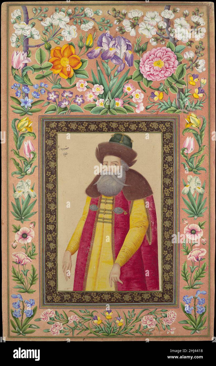'Portrait of the Russian Ambassador, Prince Andrey Priklonskiy', Folio from the Davis Album dated A.H. 1048/A.D. 1673–74 Painting by 'Ali Quli Jabbadar This portrait from the Davis Album is one of several similar works depicting the same subject. From the velvet vest and furred collar and cap, the sitter can be identified as a Russian dignitary. In 1673, as the silk trade was growing between Iran and Russia, Czar Aleksey Mikhailovich sent Prince Andrey Priklonskiy as his ambassador to the court of Shah Sulaiman of Iran. Elements of the Indo-Persian style are evident in the gilt border of flowe Stock Photo
