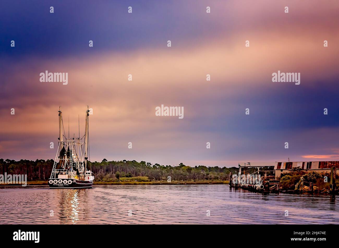 Apalachee Girl, a shrimp boat, heads home after a long day of shrimping, Oct. 27, 2013, in Bayou La Batre, Alabama. Stock Photo