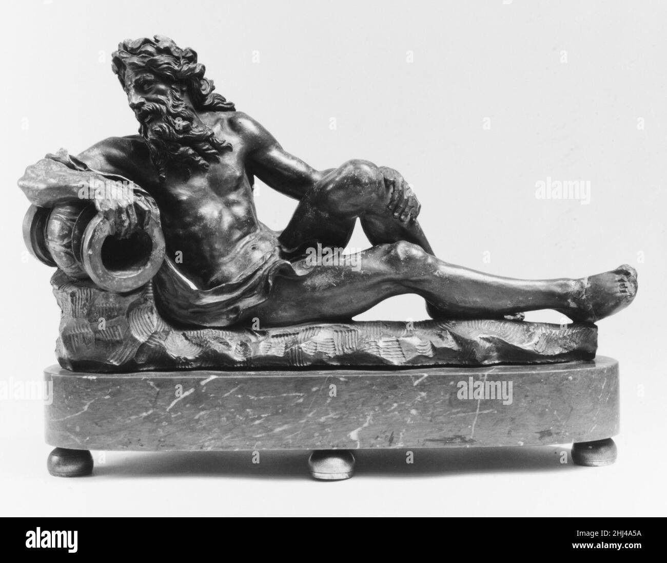 River God ca. 1700 probably Flemish This and another pendant Neptune (1973.184.2a, b) are models, probably for much larger garden figures. They are amusingly distorted imitations of types current in French baroque classicism, in the manner of Girardon and Coysevox but gone awry.. River God  205516 Stock Photo
