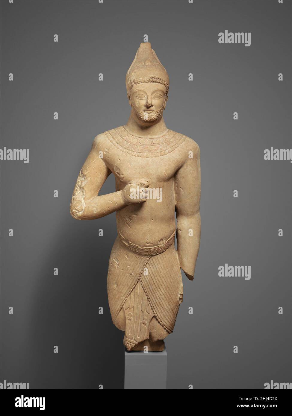 Limestone male figure in Egyptian dress 3rd quarter of the 6th century