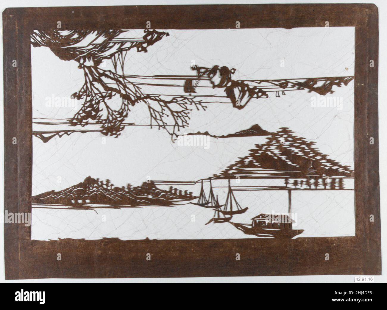 Stencil with Pattern of Seascape on White Ground 19th century Japan Stencils like these were traditionally used in Japan in a resist-dyeing process to produce lengths of patterned cloth. A length of white cloth was stretched out and paste was applied through the stencil, which was then removed to the next area and the next until the entire length was covered. The cloth was then dyed, usually with indigo, and the areas covered with the paste resisted the dye. In both of these stencils, note that half of the pattern is upside down, resulting in a finished product in which either end can serve as Stock Photo