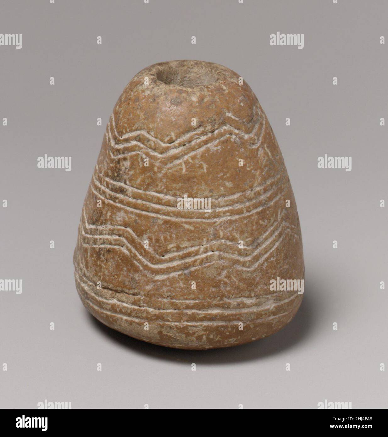 Terracotta spindle whorl ca. 20001725 B.C. Cypriot Spindle whorls