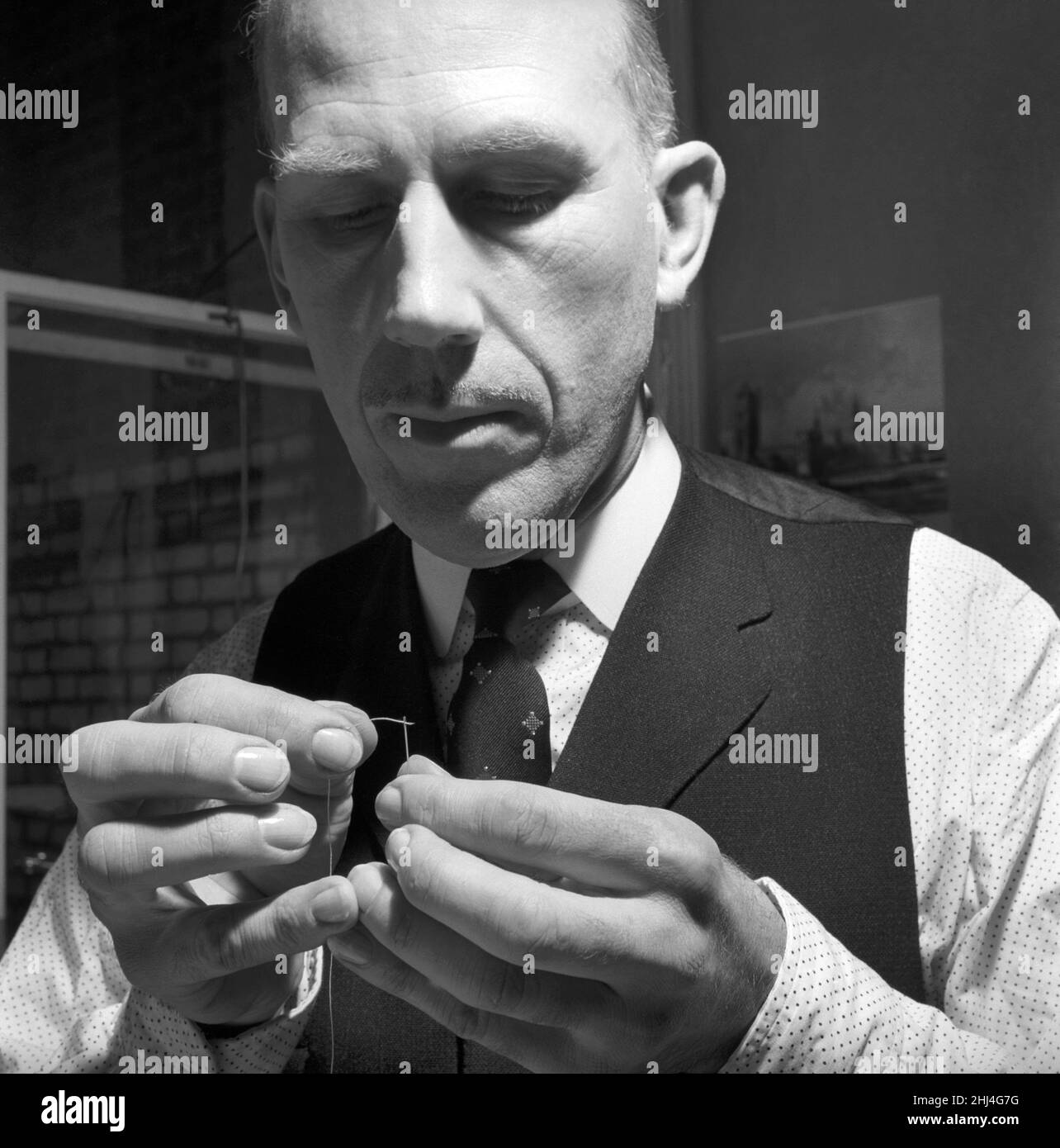Tailor measuring Black and White Stock Photos & Images - Alamy