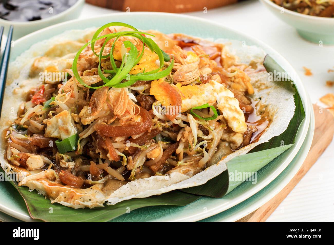 Lumpia Basah Bandung, Popular Traditional Street Food Snack Made from Thin Wrapper with Saute Spicy Soy Bean Sprout and Bamboo Sprout, add with Sticky Stock Photo