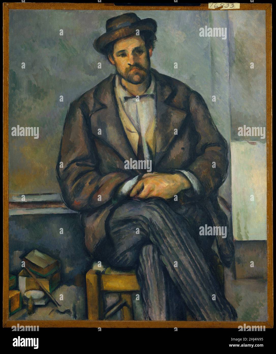 Seated Peasant ca. 1892–96 Paul Cézanne French The mood and palette of this pensive figure study relate it to Cézanne's celebrated series of paintings showing men playing cards. This particular individual does not appear in any of those pictures, but there can be no doubt that he, like the models for the card players, was one of the workers at Jas de Bouffan, the Cézanne family estate in Aix-en-Provence.. Seated Peasant  437990 Stock Photo