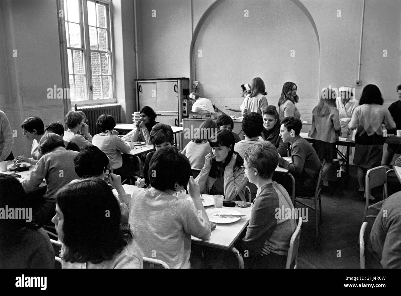School Dinners. General scenes of school dinner. Ladies serving meal to