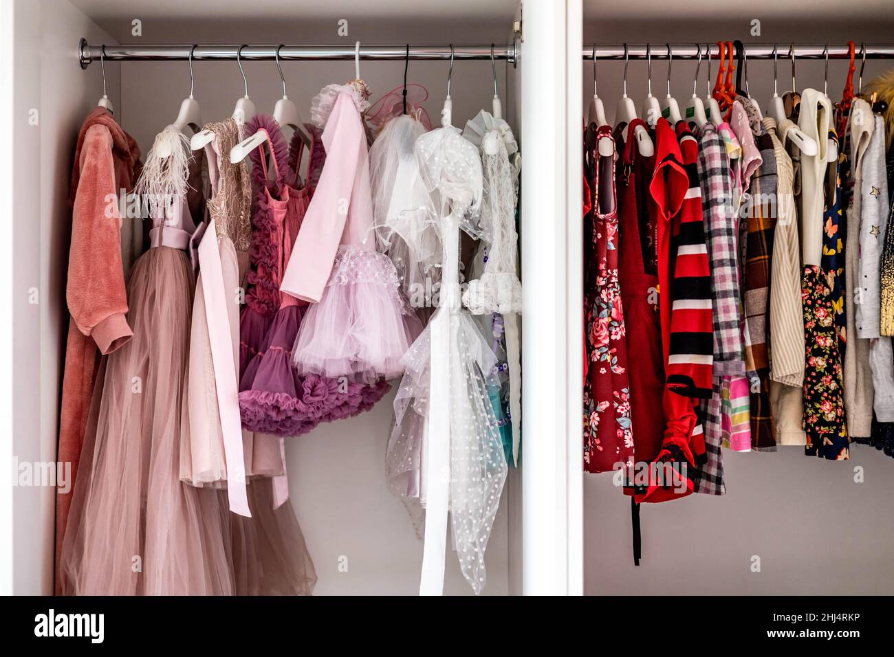 Female childish wardrobe apparel hanged comfortable vertical storage Marie Kondo minimalist
