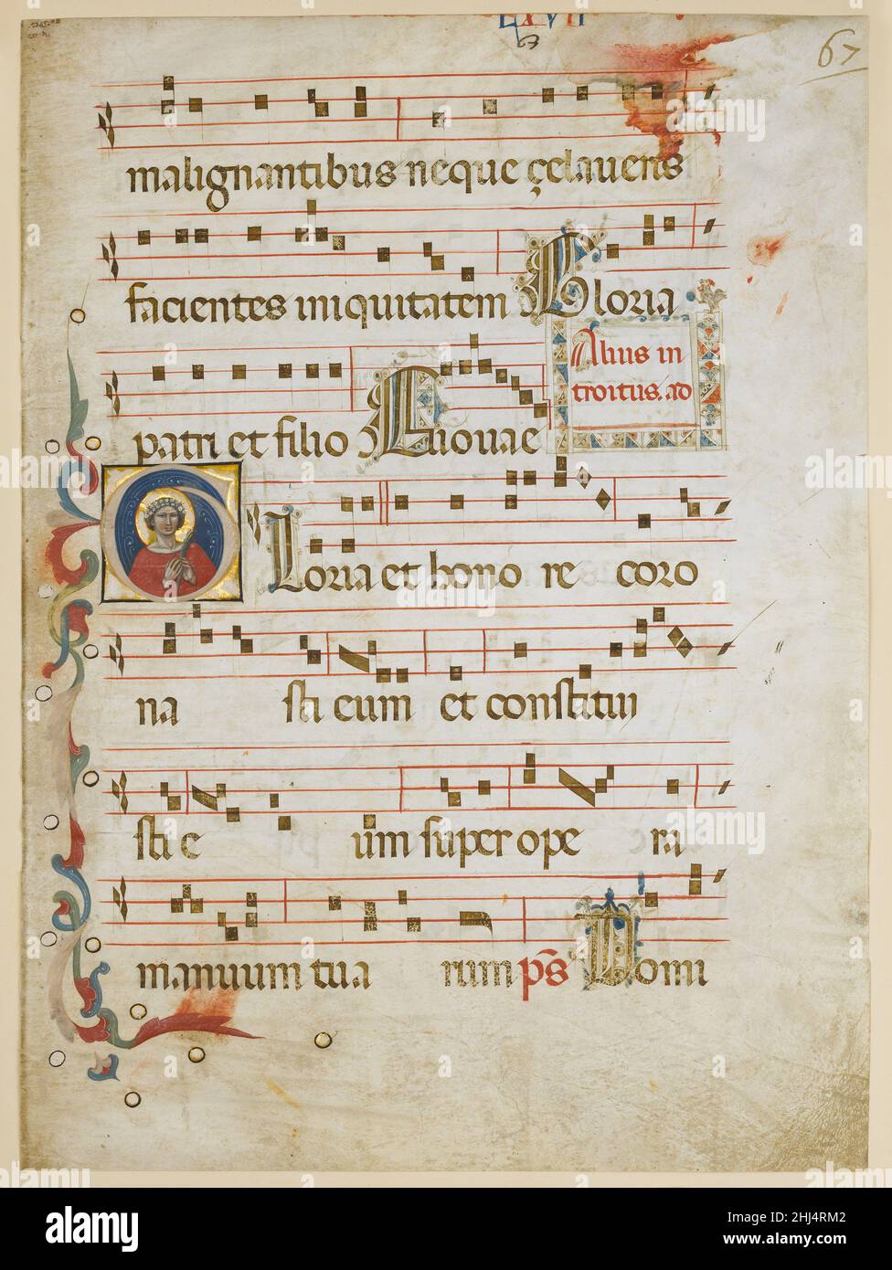 Manuscript Leaf with a female saint (possibly Dorothy) in an Initial G, from a Gradual ca. 1330–40 Attributed to the Illustratore. Manuscript Leaf with a female saint (possibly Dorothy) in an Initial G, from a Gradual  467419 Stock Photo
