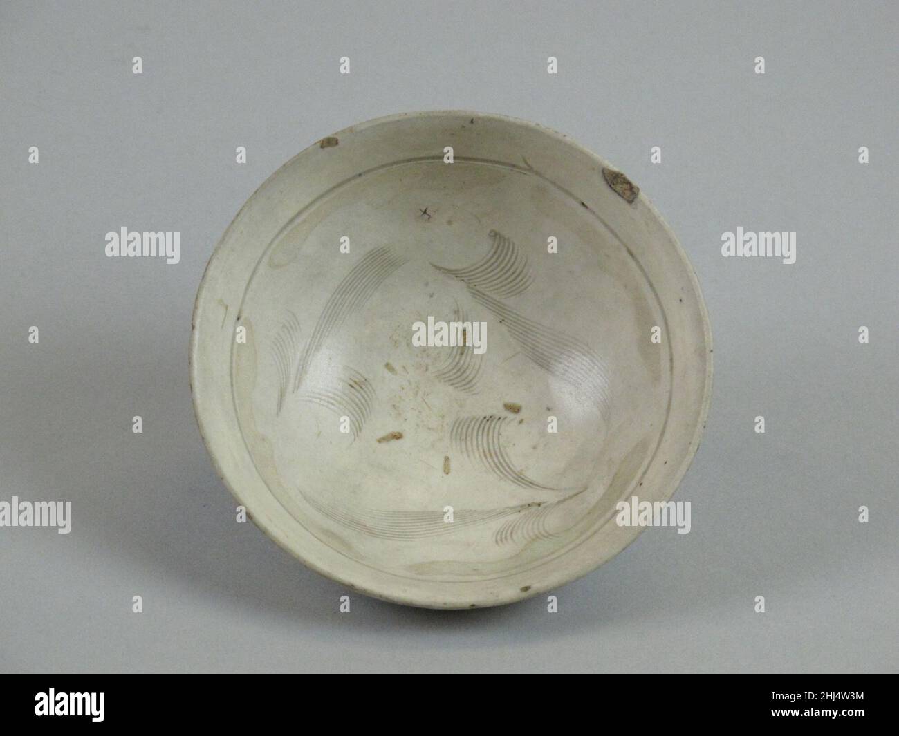 Bowl with wave pattern 13th–14th century China. Bowl with wave pattern  48143 Stock Photo