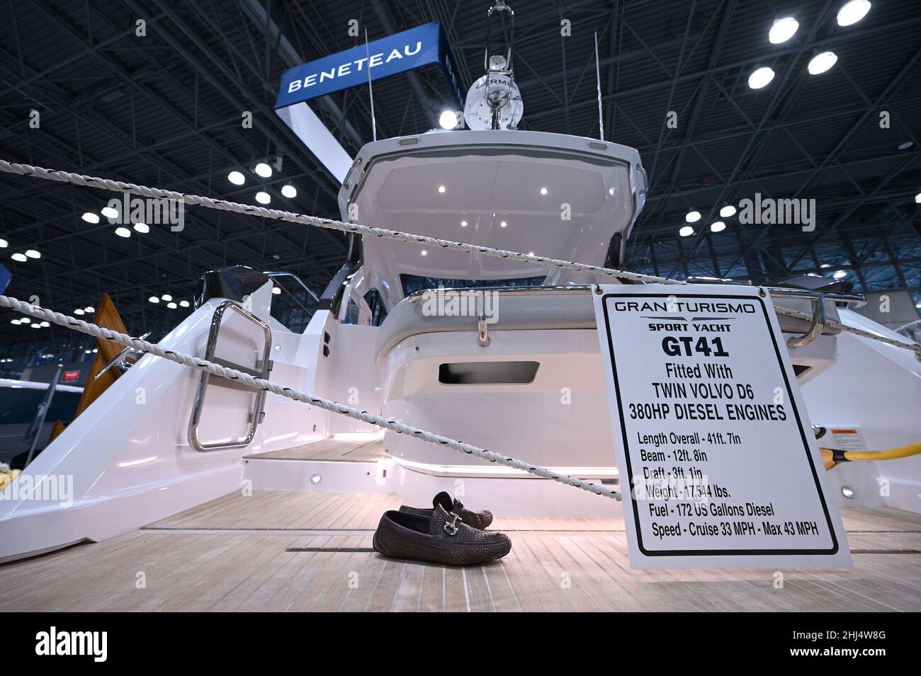 A pair of shoes rests on the rear deck of a Gran Turismo GT41 Sports ...