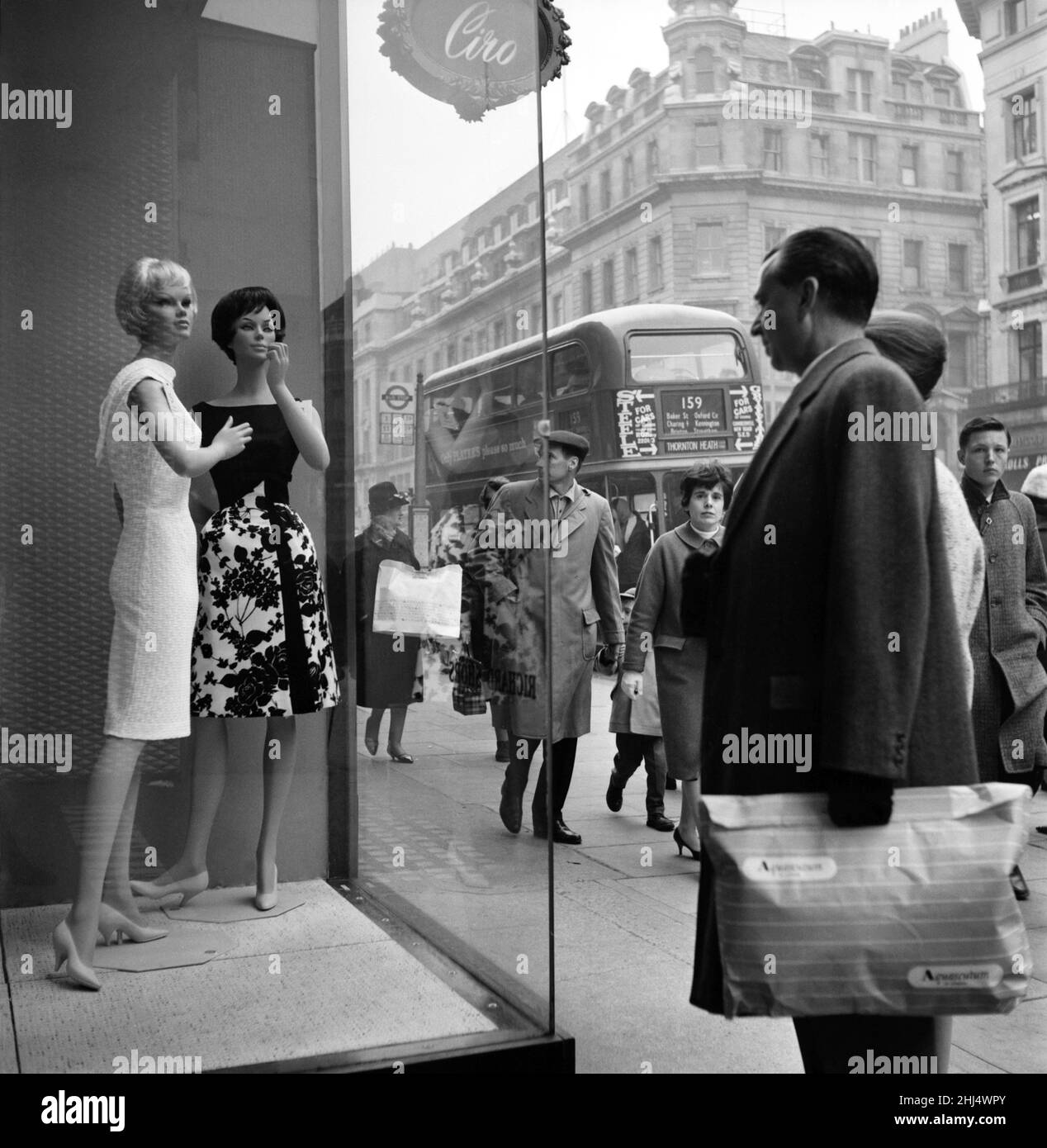 Who's the dummy? Window shopping in Oxford Street, London. 1960 Stock ...