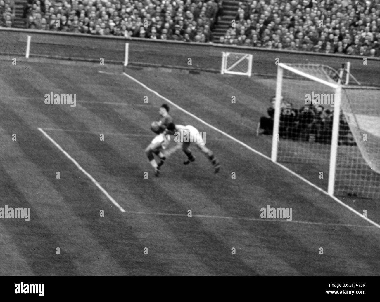 Aston Villa 2-1 Manchester United, FA Cup Final 1957, Wembley Stadium, Saturday 4th May 1957. The final was marred by a collision after only six minutes between Villa forward Peter McParland and United goalkeeper Ray Wood, which left Wood unconscious with a broken cheekbone. Stock Photo