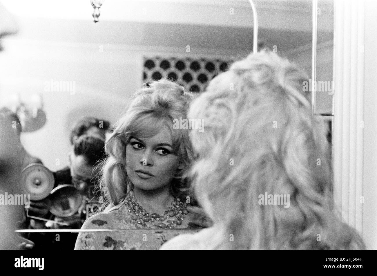 Brigitte Bardot, arrives in London, Thursday 9th April 1959. Brigitte is staying at the Mount Royal Hotel, London. She is in the country to complete her latest film 'Babette Goes to War.' Stock Photo
