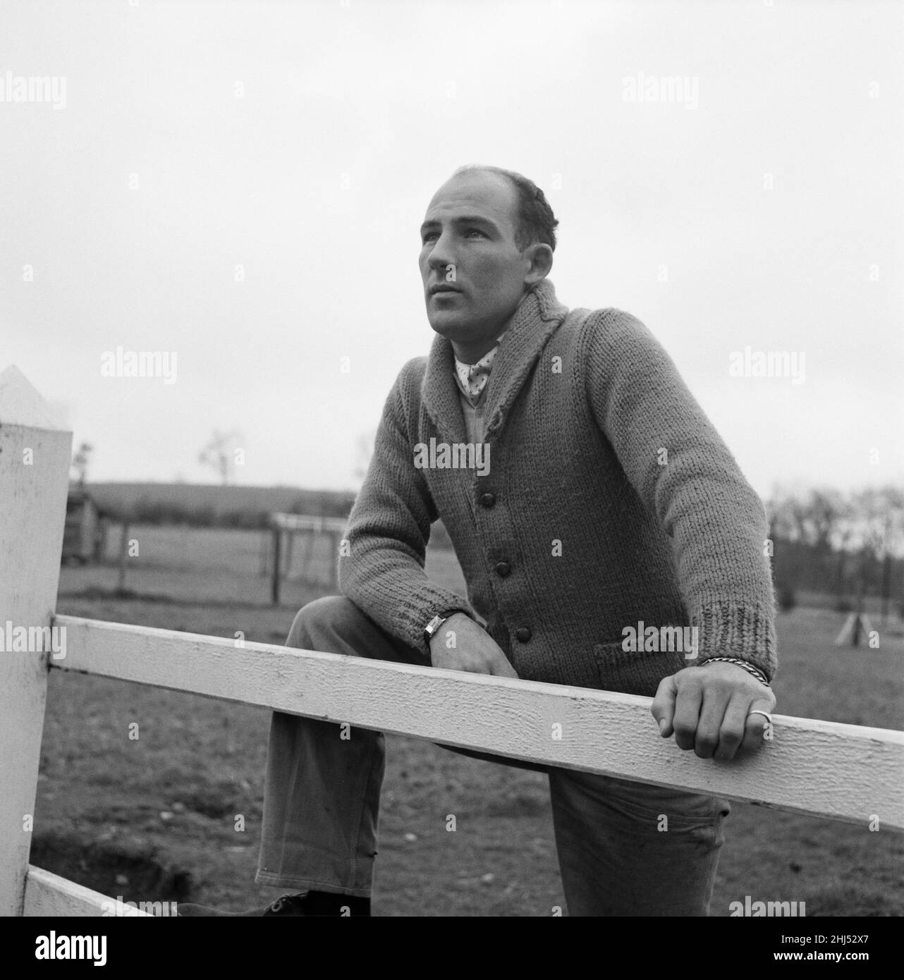 Racing driver Stirling Moss pictured at Nunney, near Frome, Somerset, where he is staying at the home of Mr Robin Walker. 13th March 1960. Stock Photo