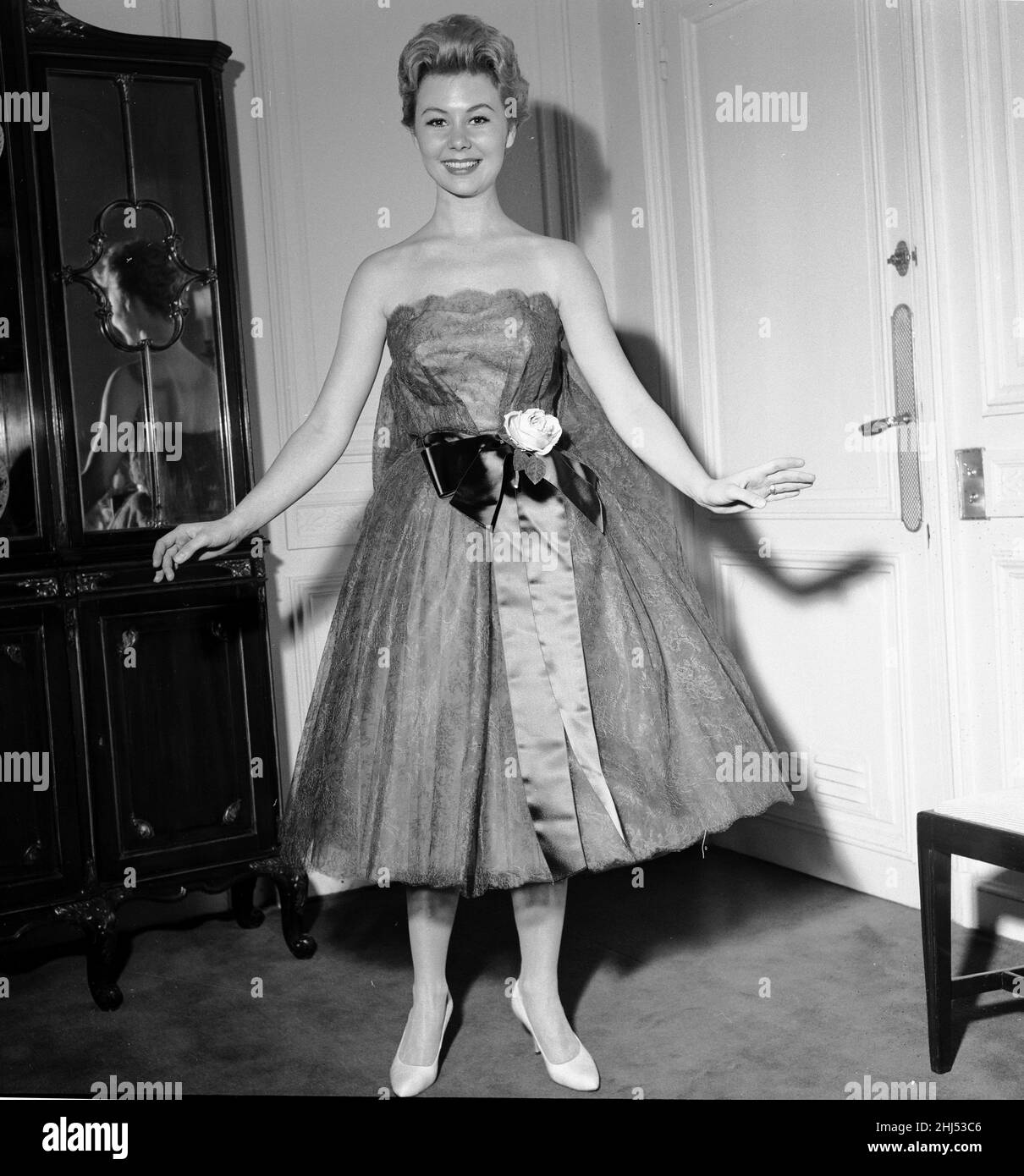 Mitzi Gaynor, American actress, singer & dancer, who is in the UK to promote her new film 'South Pacific' which opens in London this week, April 1958.    Pictured in her hotel room at the Savoy Hotel in London. Stock Photo