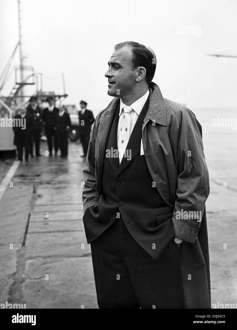 Spanish centre forward Alfredo Di Stefano of football team Real Madrid on arrival at London Airport. 22nd April 1957. Stock Photo