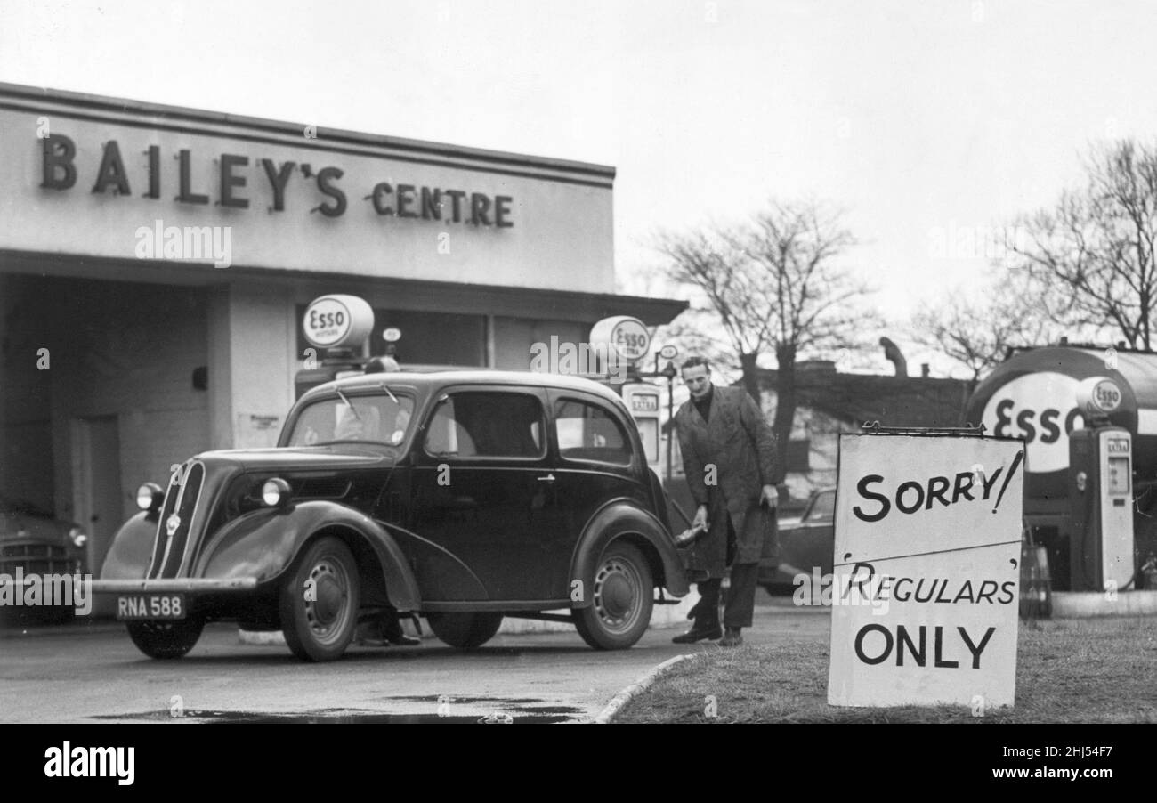 Austin Car being filled at a Petrol Station.27th November 1956 Stock
