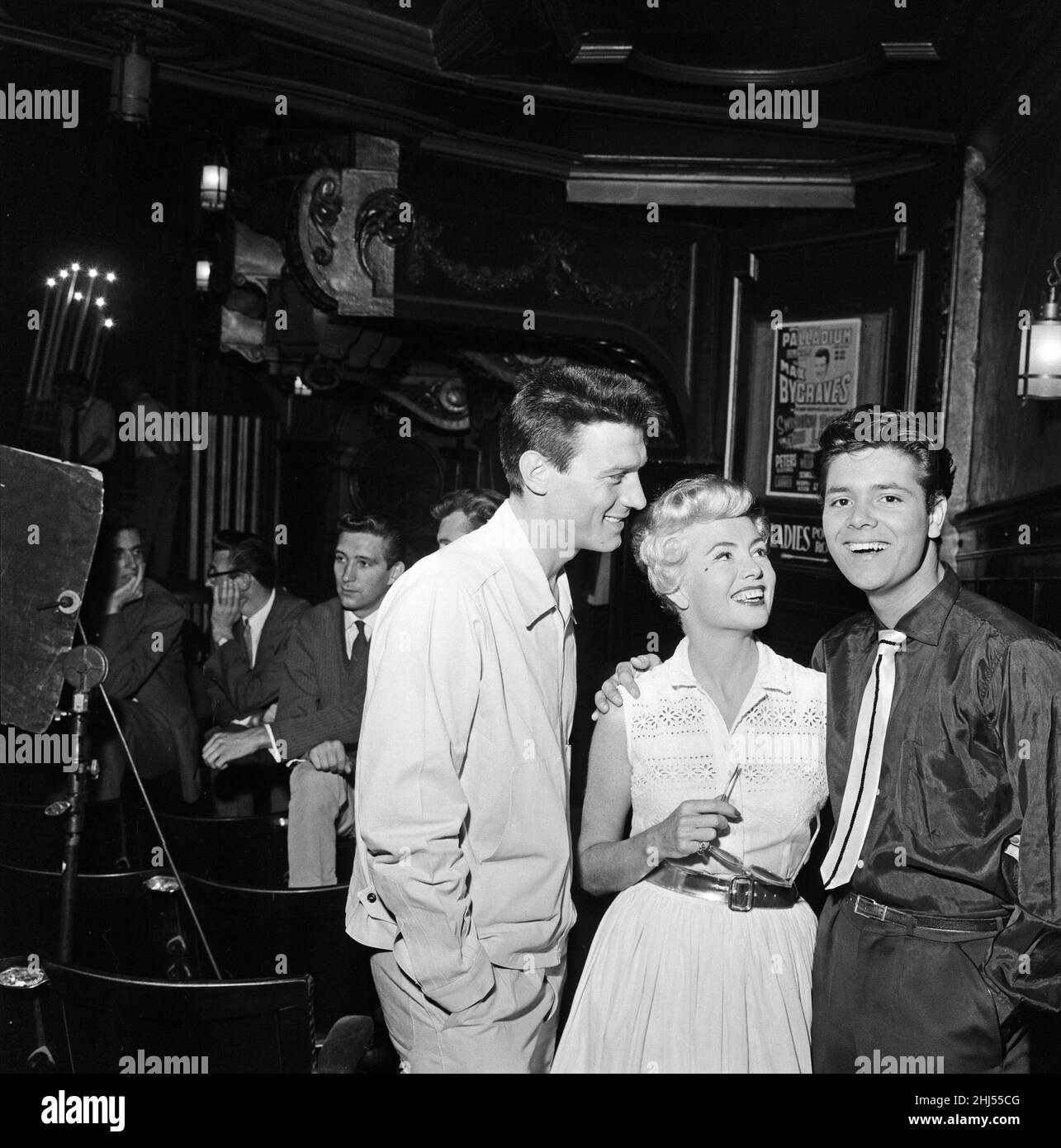 On the set of the film Expresso Bongo, left to right, Laurence Harvey,Yolande Donlan and Cliff Richard. 27th July 1959. Stock Photo