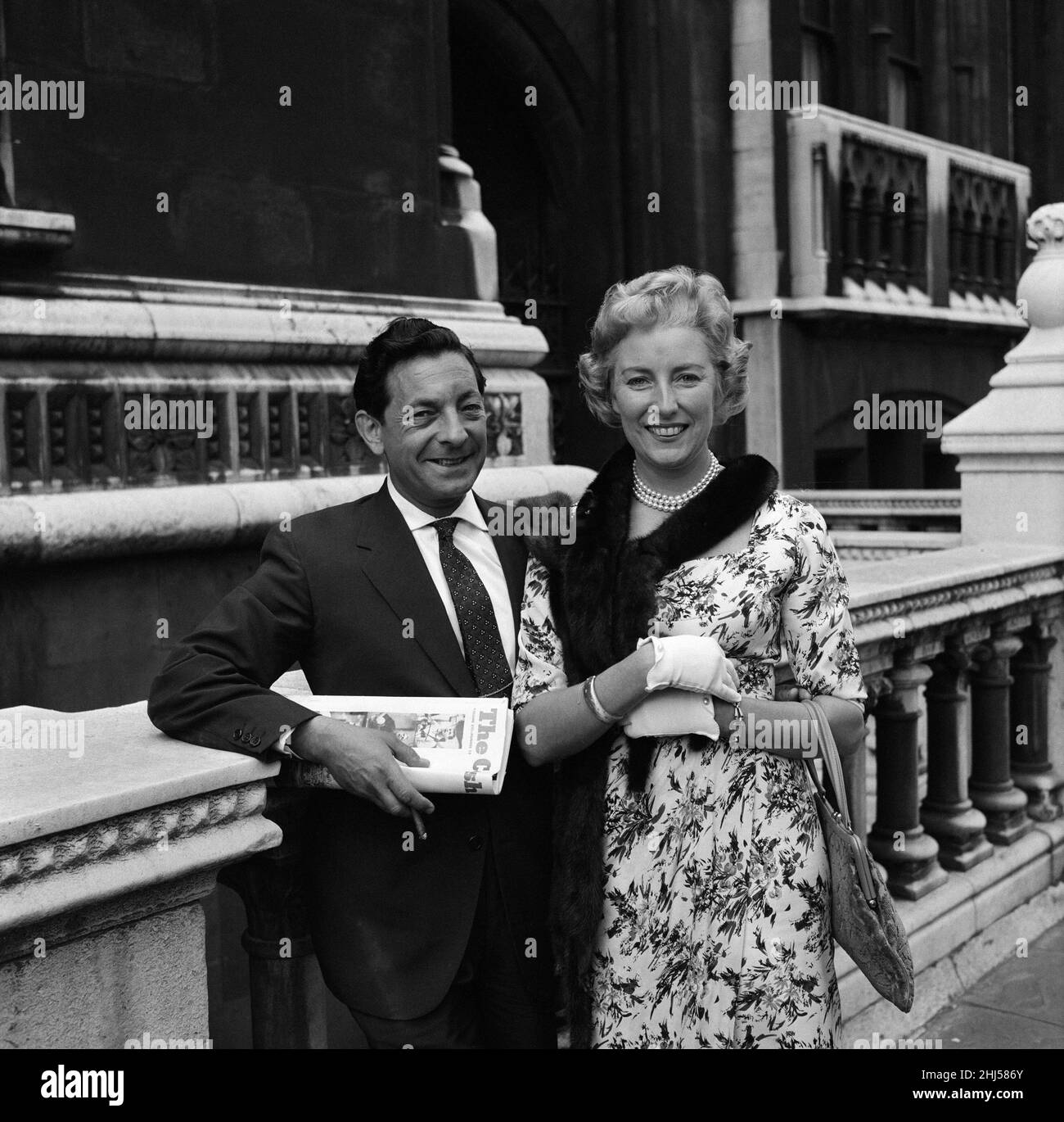Vera Lynn and her husband Harry Lewis pictured after she was given judgement in a music copyright. A judge ruled that the song 'Travellin' Home', which Miss Lynn sang three years ago, did not infringe the copyright of 'Westering Home', a tune arranged by Sir Hugh Robertson. 31st May 1960. Stock Photo