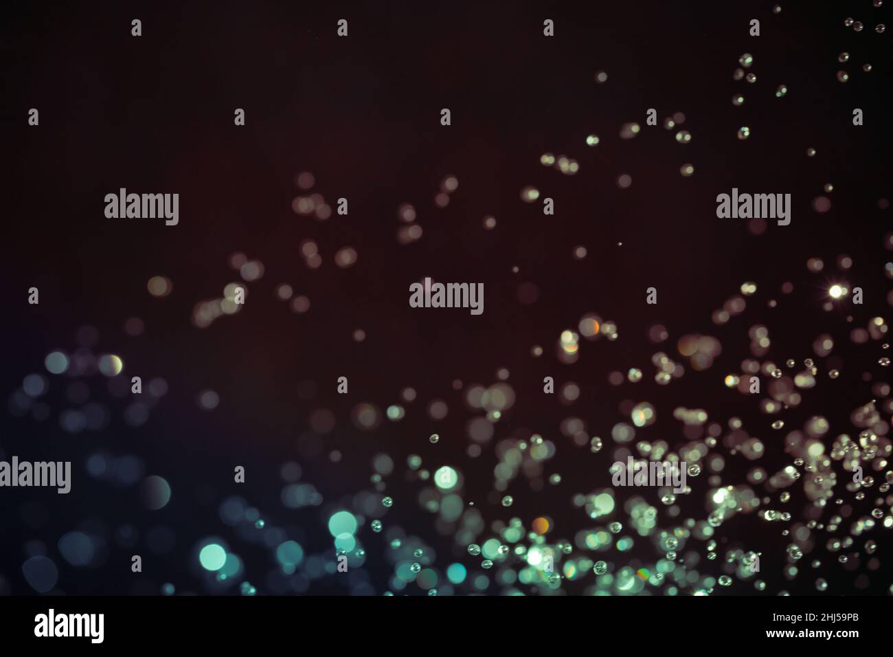 Abstract bokeh texture on black background Stock Photo - Alamy