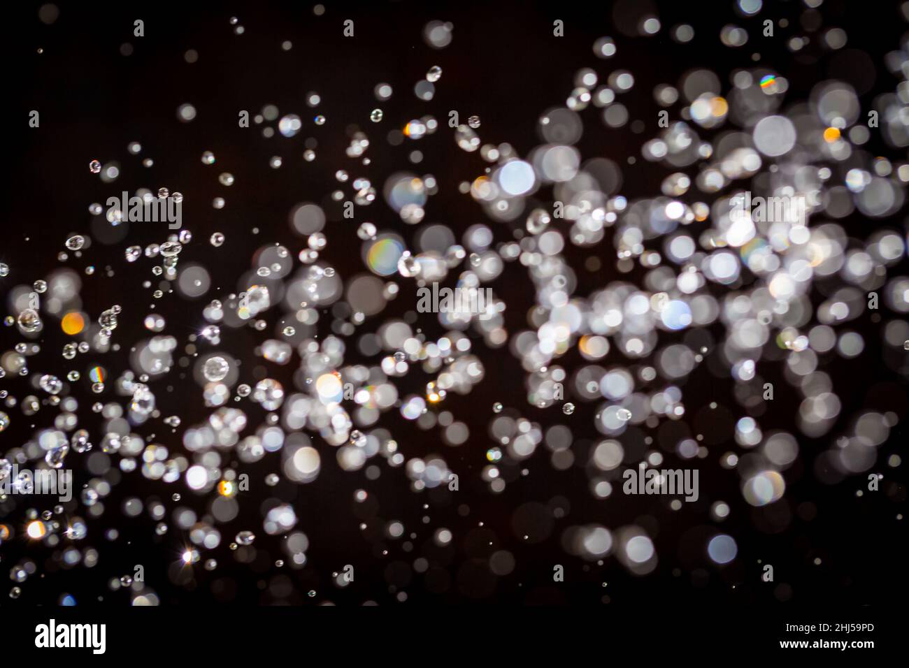 Abstract bokeh texture on black background Stock Photo - Alamy
