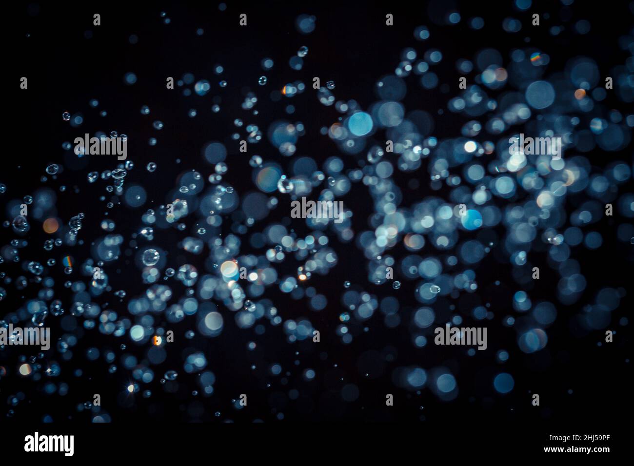 Abstract bokeh texture on black background Stock Photo - Alamy