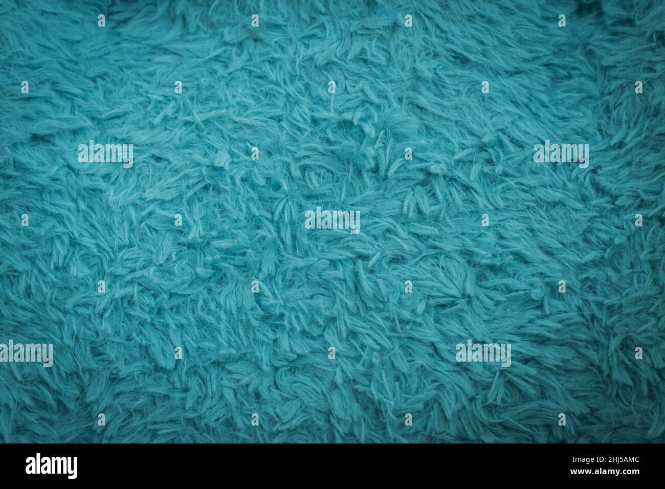 Beautiful sparkling artificial blue fur texture background Stock Photo
