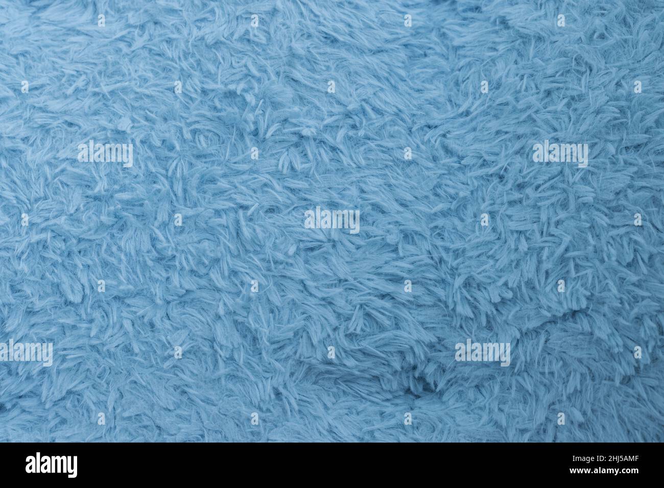 Beautiful sparkling artificial blue fur texture background Stock Photo