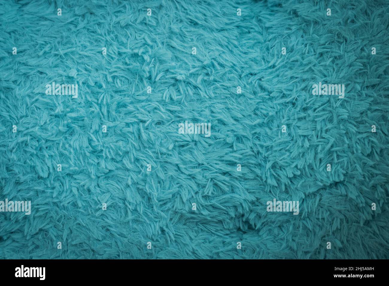 Beautiful sparkling artificial blue fur texture background Stock Photo