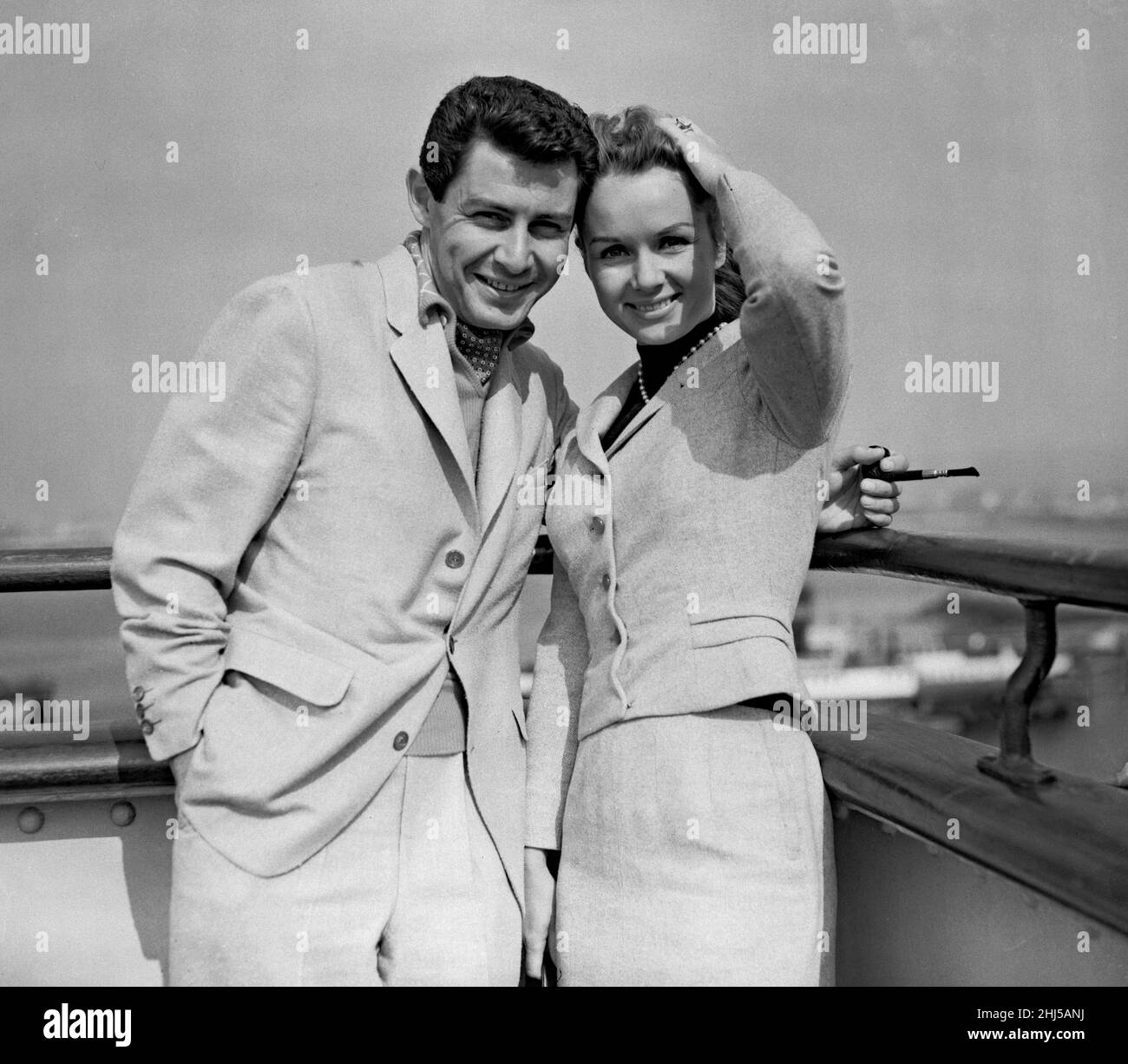 Debbie Reynolds and Eddie Fisher photographed aboard the Queen Elizabeth when she arrived at Cherbourg. 3rd June 1957. Stock Photo