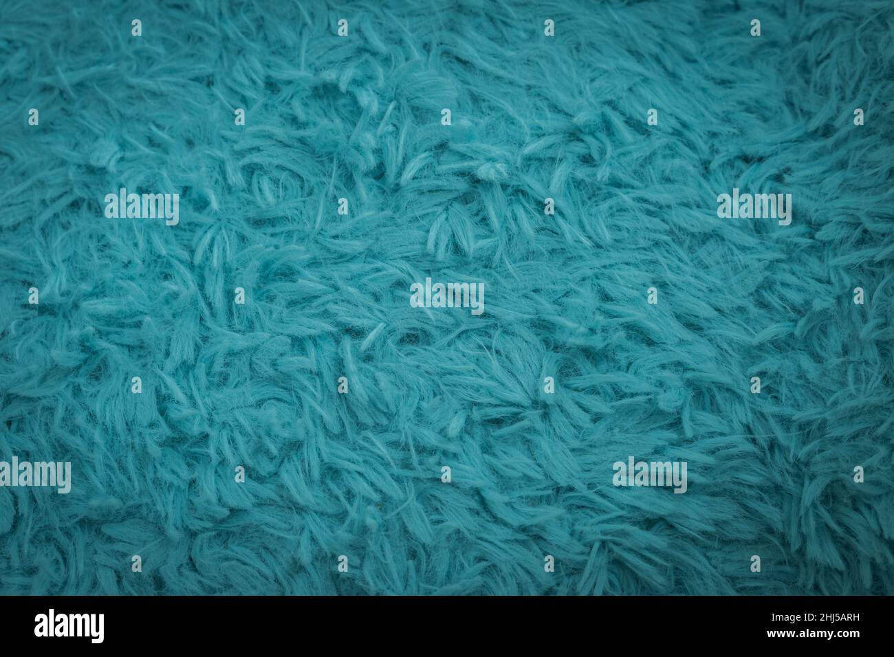 Beautiful sparkling artificial blue fur texture background Stock Photo