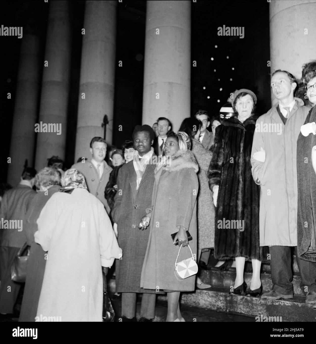 Scenes in Trafalgar Square Fountain as the New Year comes in. Thousands congregated on the square for the occasion. 1st January 1960. Stock Photo
