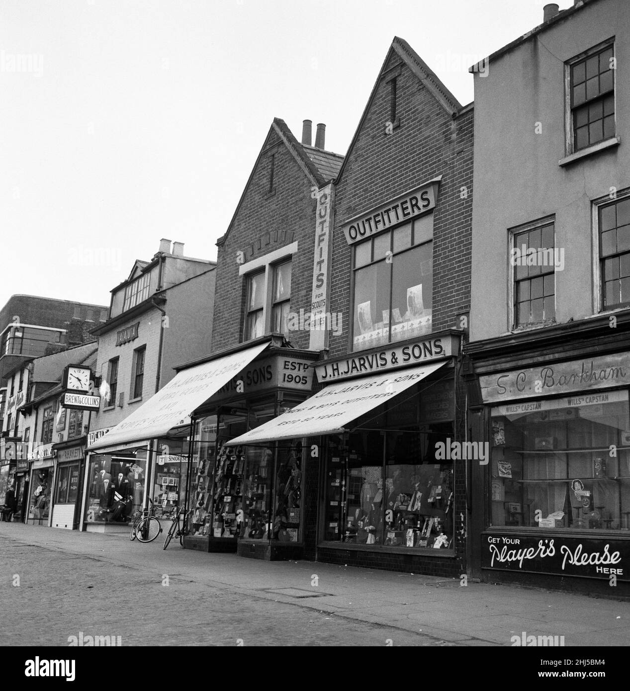 The parade of shops in the market place, Romford, London. 18th March