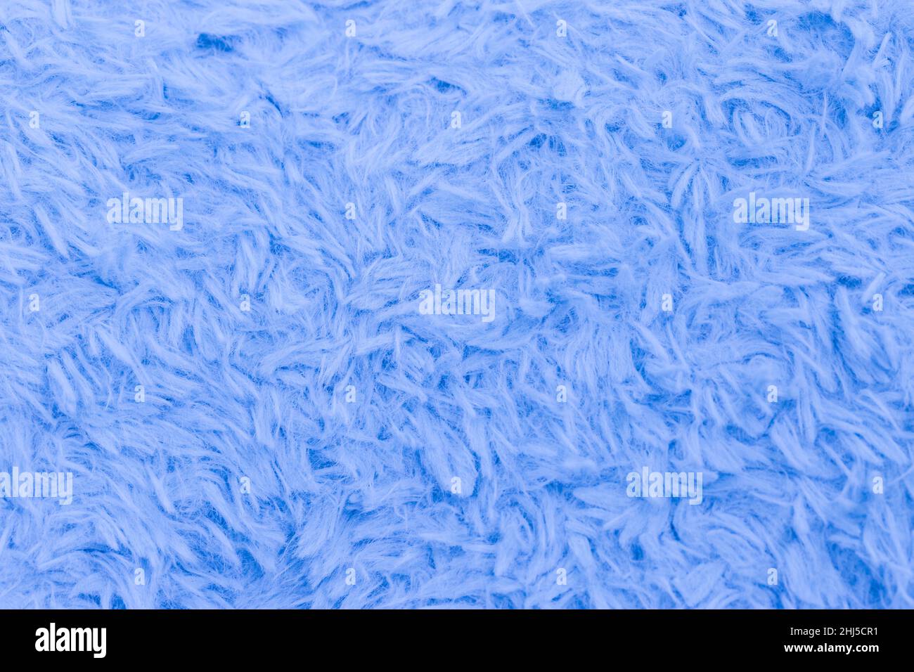 Beautiful sparkling artificial blue fur texture background Stock Photo