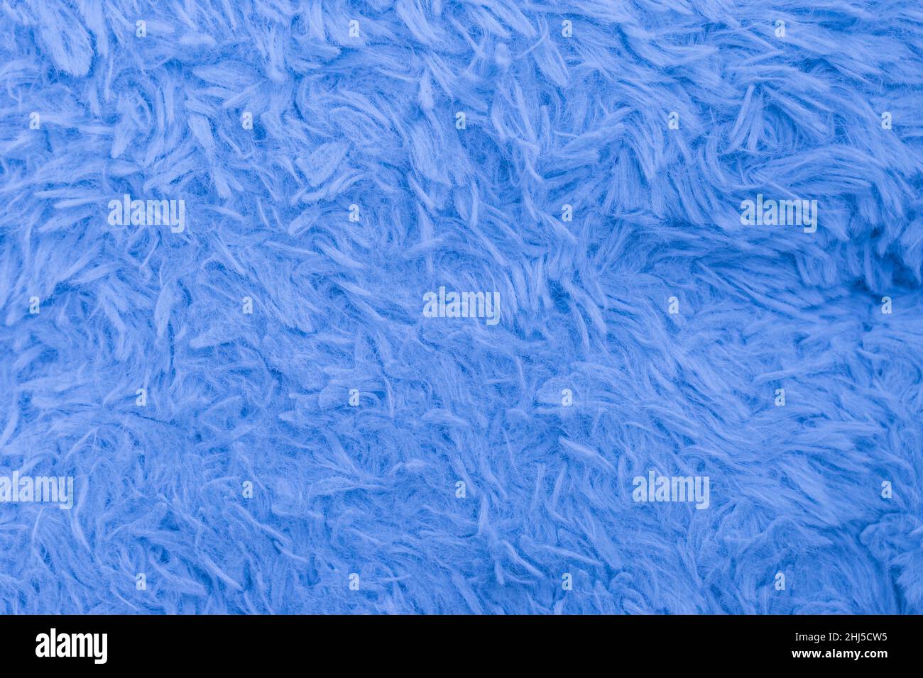 Beautiful sparkling artificial blue fur texture background Stock Photo