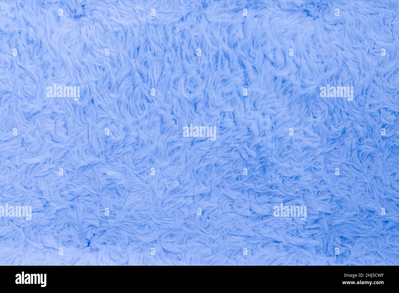 Beautiful sparkling artificial blue fur texture background Stock Photo