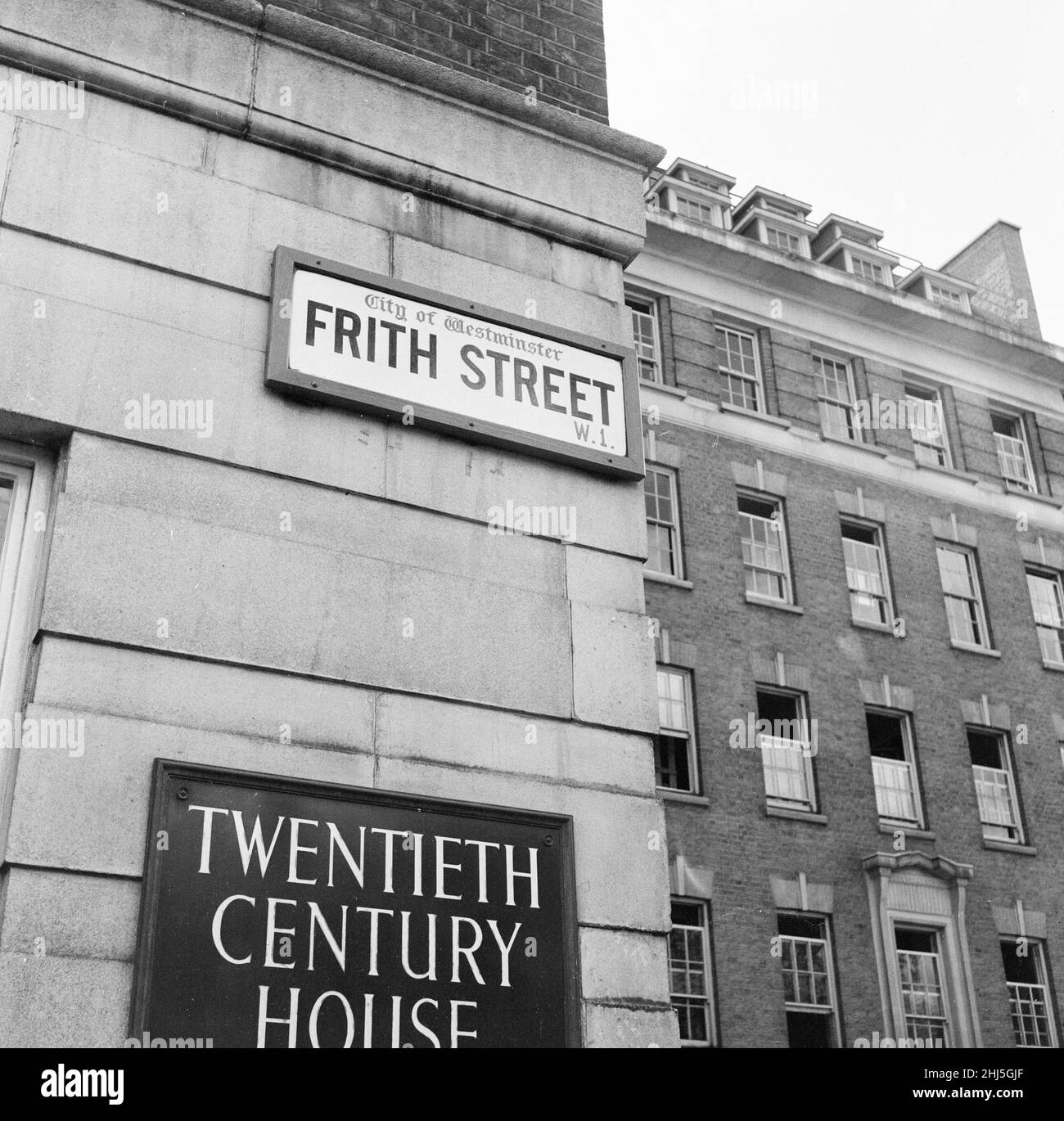 General view of Frith Street, Soho, London, 26th June 1956. Twentieth Century House occupies the site of three old houses, Nos. 31 and 32 Soho Square and No. 67 Frith Street. Stock Photo